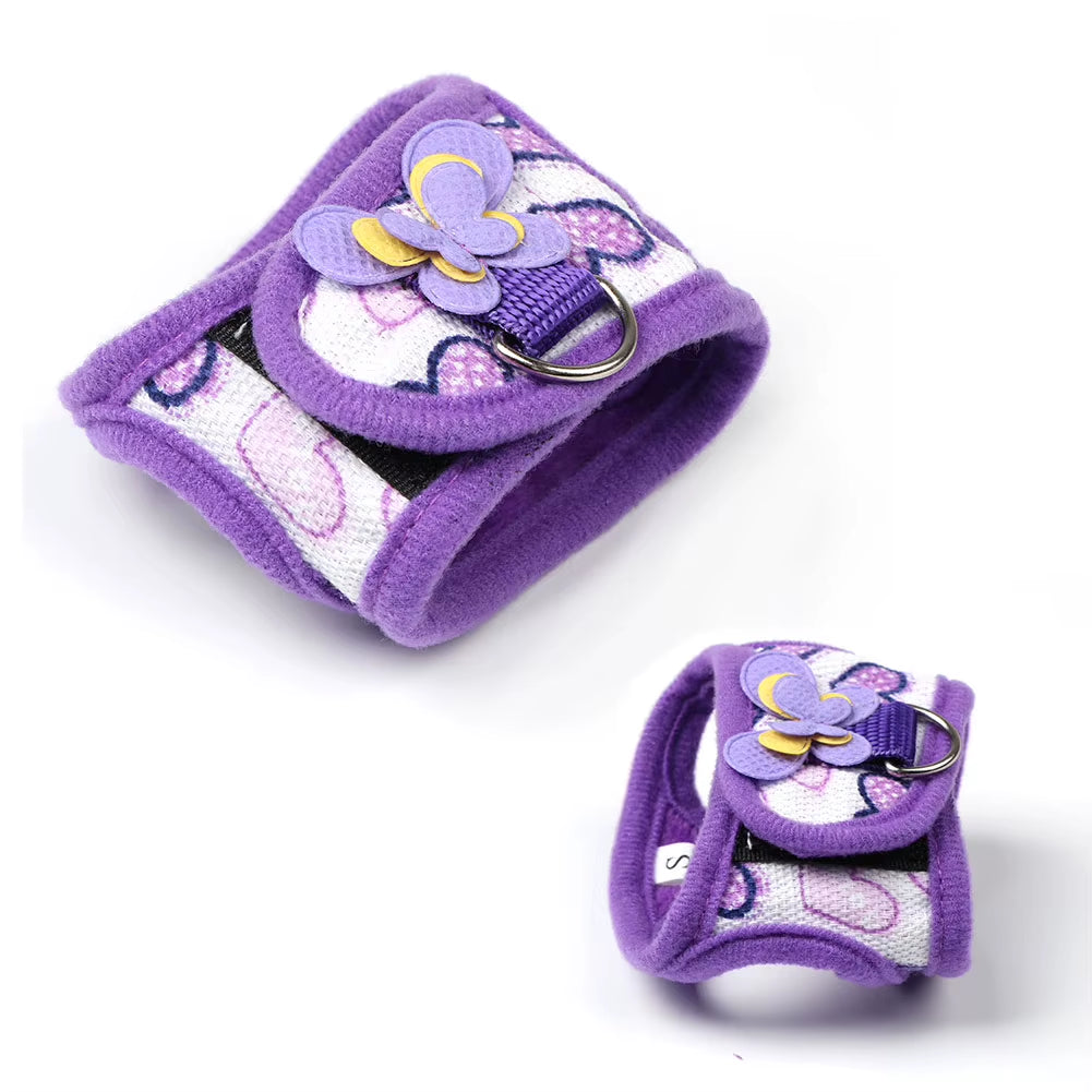 Purple butterfly-accent small-pet harness on a guinea pig