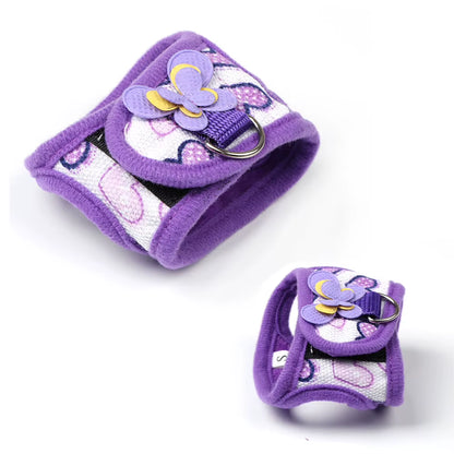 Purple butterfly-accent small-pet harness on a guinea pig