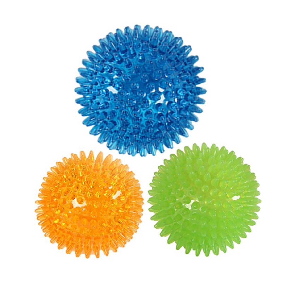 Three spiky squeaky dog balls in bright colors